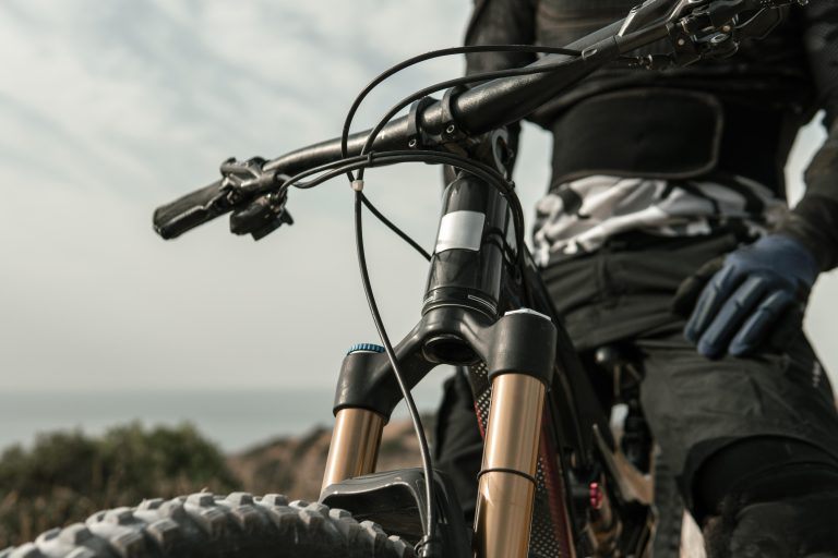man-riding-mountain-bike-close-up
